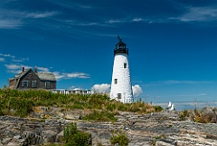 Wood Island Lighthouse Over Rocky Ground in Maine